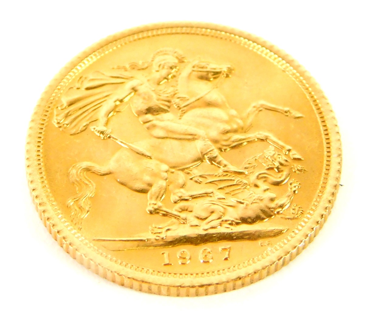 An Elizabeth II full gold sovereign 1967, 8.0g., with a display strut frame. - Image 2 of 3