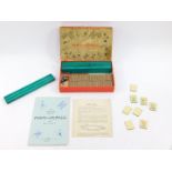 A Chad Valley Mah - Jong set, boxed with instructions.