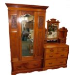 A Victorian carved walnut bedroom pair, comprising single wardrobe, with mirrored door and drawer