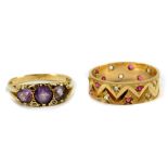 A 9ct gold and amethyst three stone ring, size N, and a 9ct gold and gem set band, size O, 5.0g.