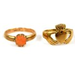 A 9ct gold Claddagh ring, size O, 3.3g., together with a 9ct gold and coral ring, size Q, 3.1g. (2)