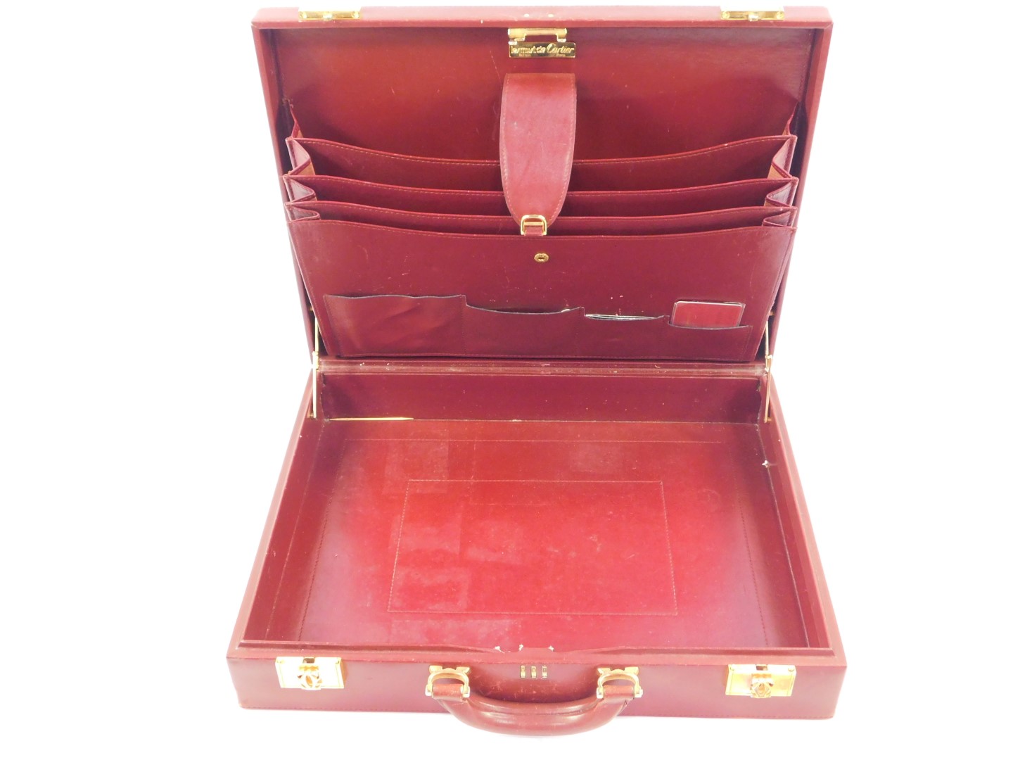 A Le Must De Cartier red leather briefcase, with brass fittings and mounts, Rd 1975, 43cm wide. - Image 3 of 4