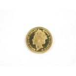 A 9ct gold Silver Jubilee token 1977, obverse portrait of HM The Queen, reverse the Royal Coat of