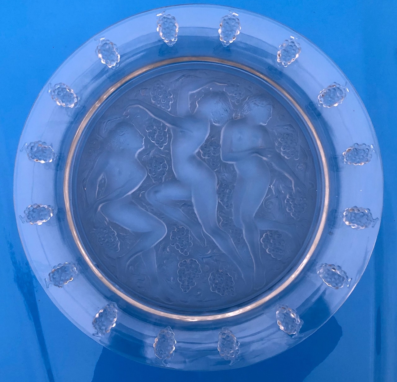 A Lalique clear and frosted glass plate, decorated in the Cote D'or pattern, moulded with the