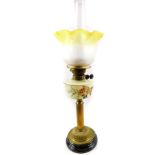 A Duplex brass oil lamp, with a floral painted opaline glass reservoir, glass chimney, and clear