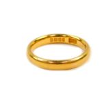 A 22ct gold wedding band, size Q/R, 6.2g.