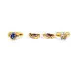 A Royal Tru sapphire and cubic zirconia ring, set in yellow metal, in a crossover design, size M,