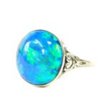 An oval opal doublet set ring, in white metal, stamped 9ct, size O, 3.2g.