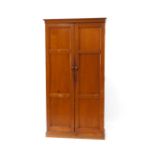 A late Victorian mahogany two door cupboard, fitted with pine stationery dividing shelves with