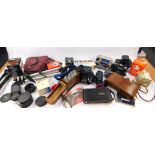 A Eumig Cine camera, model C3., Kodak camera, Zenit 11 camera, tripods, accessories and books. (a