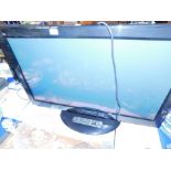 A Panasonic 37" colour television, Model TX-P37X20B, with remote and instructions.