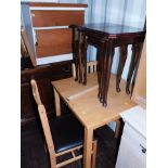 A wooden table with two matching chairs, table 75cm high, 69cm wide, 69cm deep, together with a