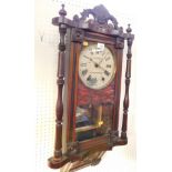 A Victorian rosewood and mahogany wall clock by G C Hardwick, Burton On Trent., enamelled tin dial