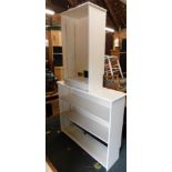 Two white painted bookcases, both enclosing two adjustable shelves, 110cm high, 126cm wide, 36cm