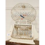 A Moorish white painted wooden and wire work bird cage, 55cm high.