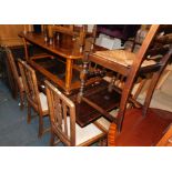 A stained oak draw leaf dining table, 76cm high, 99cm wide, 153cm extended, 76cm deep, and six oak