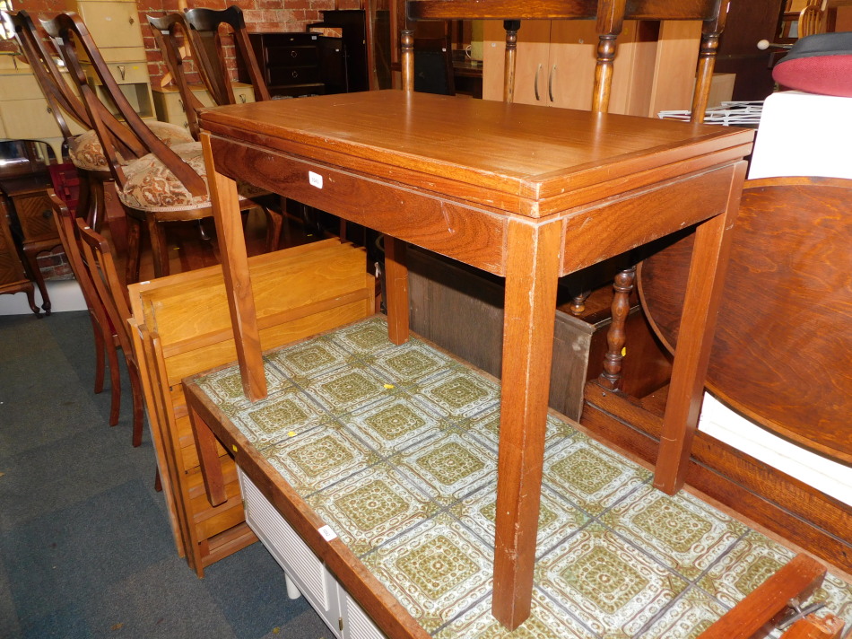 A teak games table, stamped verso AC (Military mark) 1975, raised on square legs, 71cm high, 92cm - Image 2 of 4