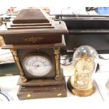 A Haller 400 day anniversary clock, on a brass base with perspex dome, 30cm high.