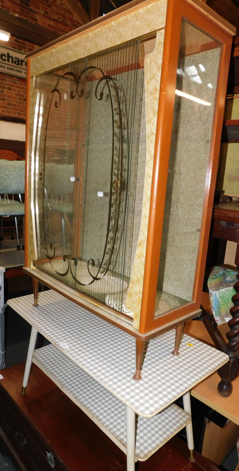 A 1960's glazed and gilt decorated china cabinet, 107cm high, 75cm wide, 30cm deep, together with