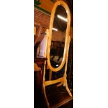 A wooden framed cheval mirror, with oval plate, 146cm high.