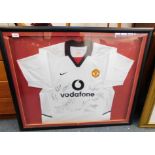 A Manchester Utd signed Vodafone white football shirt, bearing thirteen signatures, c2002/2003,