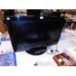 An LG 32" colour television, model number 32LG5000-ZA, with remote.