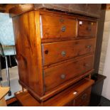 A pine chest of two over two drawers, later raised on hair pin legs, 84cm high, 84cm wide, 43cm