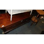 A mahogany chest, 46cm high, 121cm wide, 45cm deep, together with a 19thC bamboo side table, 71cm