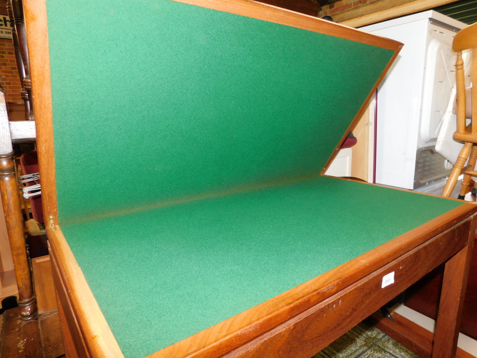 A teak games table, stamped verso AC (Military mark) 1975, raised on square legs, 71cm high, 92cm - Image 4 of 4