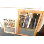 A pine framed rectangular wall mirror, 88cm high, 62cm wide., together with a beech rectangular wall