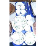 A Colclough part tea service, decorated with an Ivy pattern, Beatrix Potter mugs, Border Fine Arts