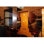 A stained oak octagonal drop leaf occasional table, 45cm high, 21cm wide, 61cm extended, 61cm deep.