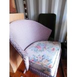 A pink Lloyd Loom tub chair, together with a mid 20thC nursing chair.(2) The upholstery in this