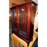 A Stag glazed display cabinet, enclosing two adjustable glass shelves, 100cm high, 81cm wide, 28cm