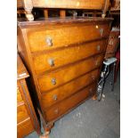 A walnut veneered chest of five graduated drawers, raised on cabriole legs, 107cm high, 78cm wide,