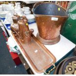 A copper coal bucket, Jersey jug, chocolate pot and a twin handled rectangular tray. (4)