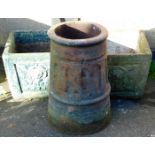 Various garden statuary, a matched pair of square tapering concrete planters, one decorated in green