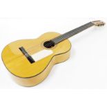 A 20thC Alhambra S A Spanish six string guitar, with shaped body and six tuning knops, 100cm wide.