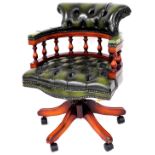 A late 20thC office captain's style swivel chair, with shaped back and arms, baluster supports, serp