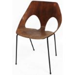 A 1960's Kandya plywood chair, on black metal legs, with pierced shaped back, labelled to the unders