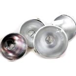 Three large chrome cased foot lights, of domed form with circular glass fronts, 50cm diameter.