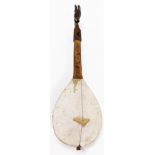 A 20thC African tribal musical instrument, with single string and springbok style head, with plain t