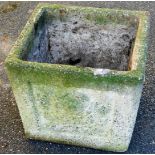 A late 20thC garden planter, of square tapering form, raised with panels of floral rosettes, 30cm hi