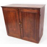 A 19thC oak cupboard, of rectangular form with panelled doors, shelves to the interior, 91cm high, 1