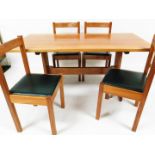 A 20thC mahogany refectory table, the oblong top on a shaped stand, with moulded legs, joined by a h