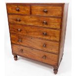 A Victorian mahogany chest, of two short and four long cock beaded drawers, raised on double bun fee