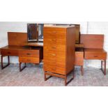 A EG G-Plan vintage teak matched bedroom suite, comprising a narrow chest of six long drawers, on sh