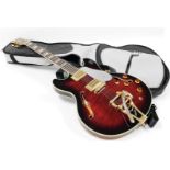 A Bigsby Shine electric guitar, with mother of pearl style inlay, shaped body, with various knops, b