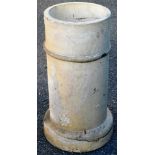 A chimney pot, of cylindrical form, on circular base, 65cm high, 34cm diameter.