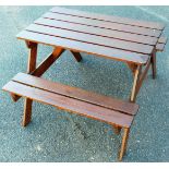 A child's slatted picnic table, with two fixed benches, 52cm high, 75cm wide, 68cm deep.